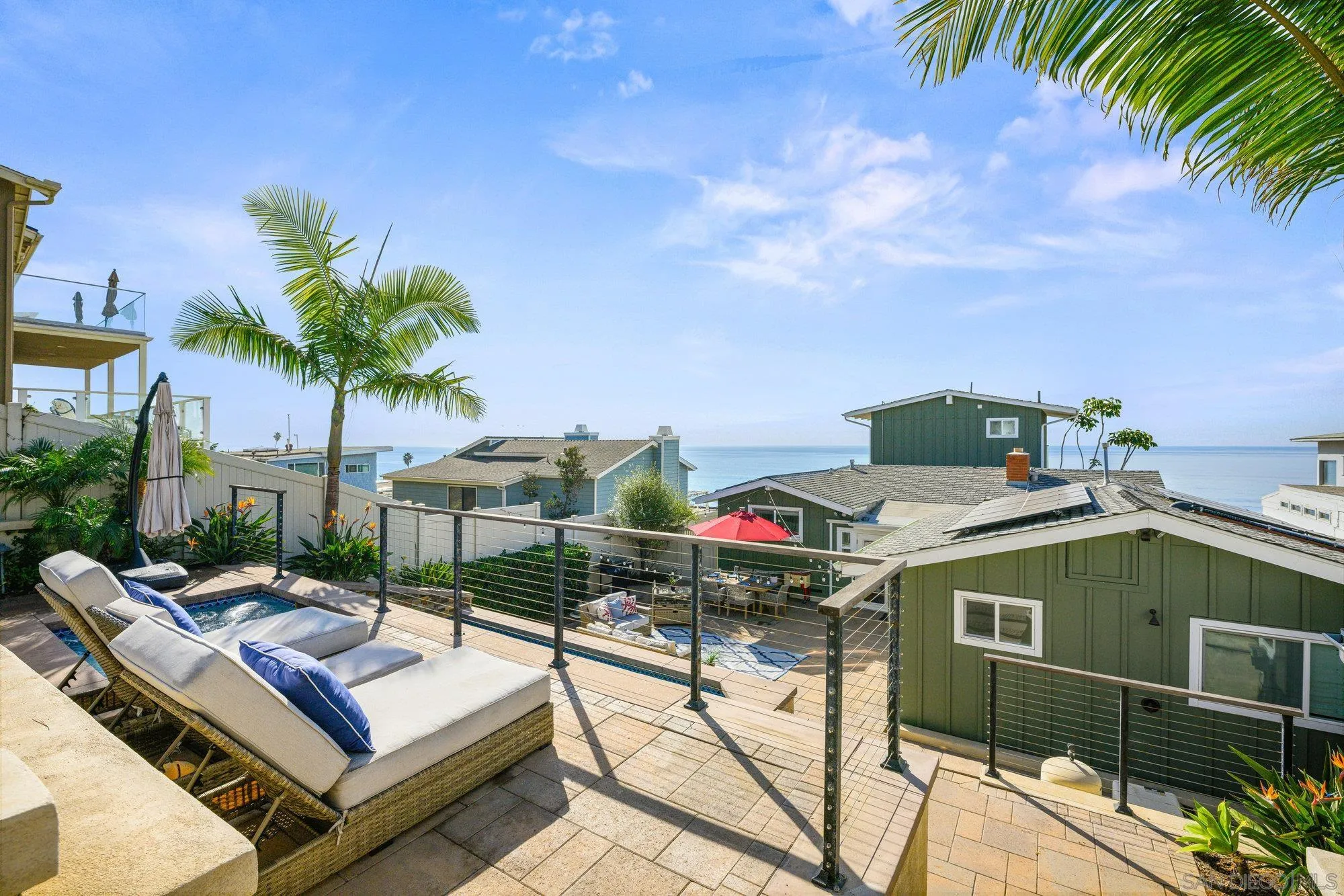 1571 San Elijo Avenue Cardiff, CA 92007 - Photo 35 of 35 a view of a patio with table and chairs potted plants with wooden fence
