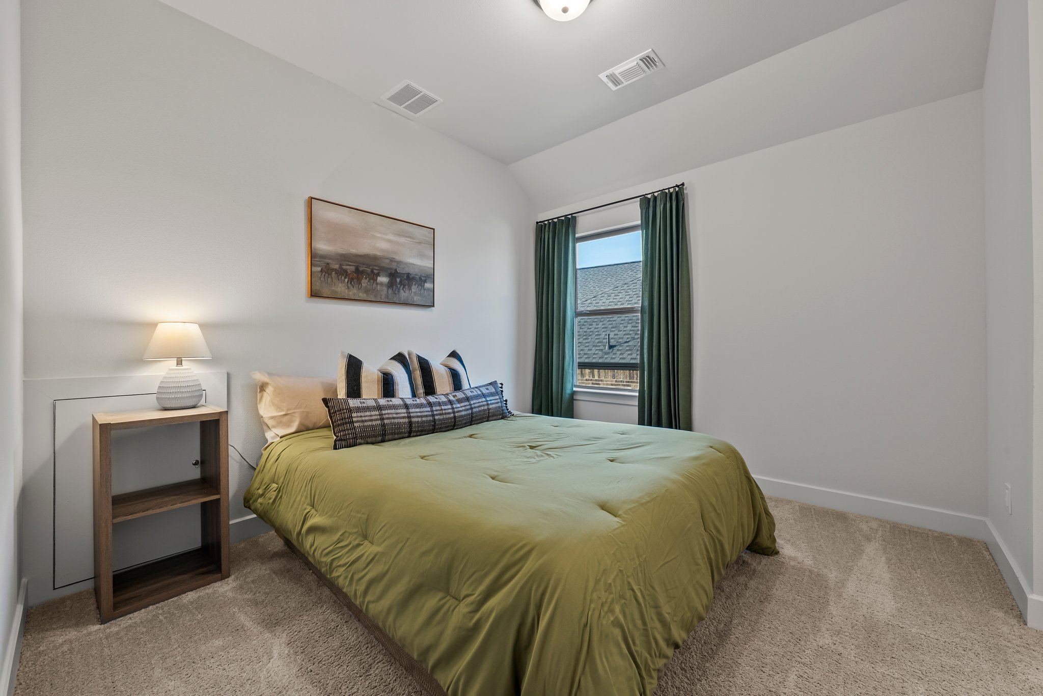 124 Low River Lane Georgetown, TX 78628 - Photo 30 of 39 a bedroom with a bed and window