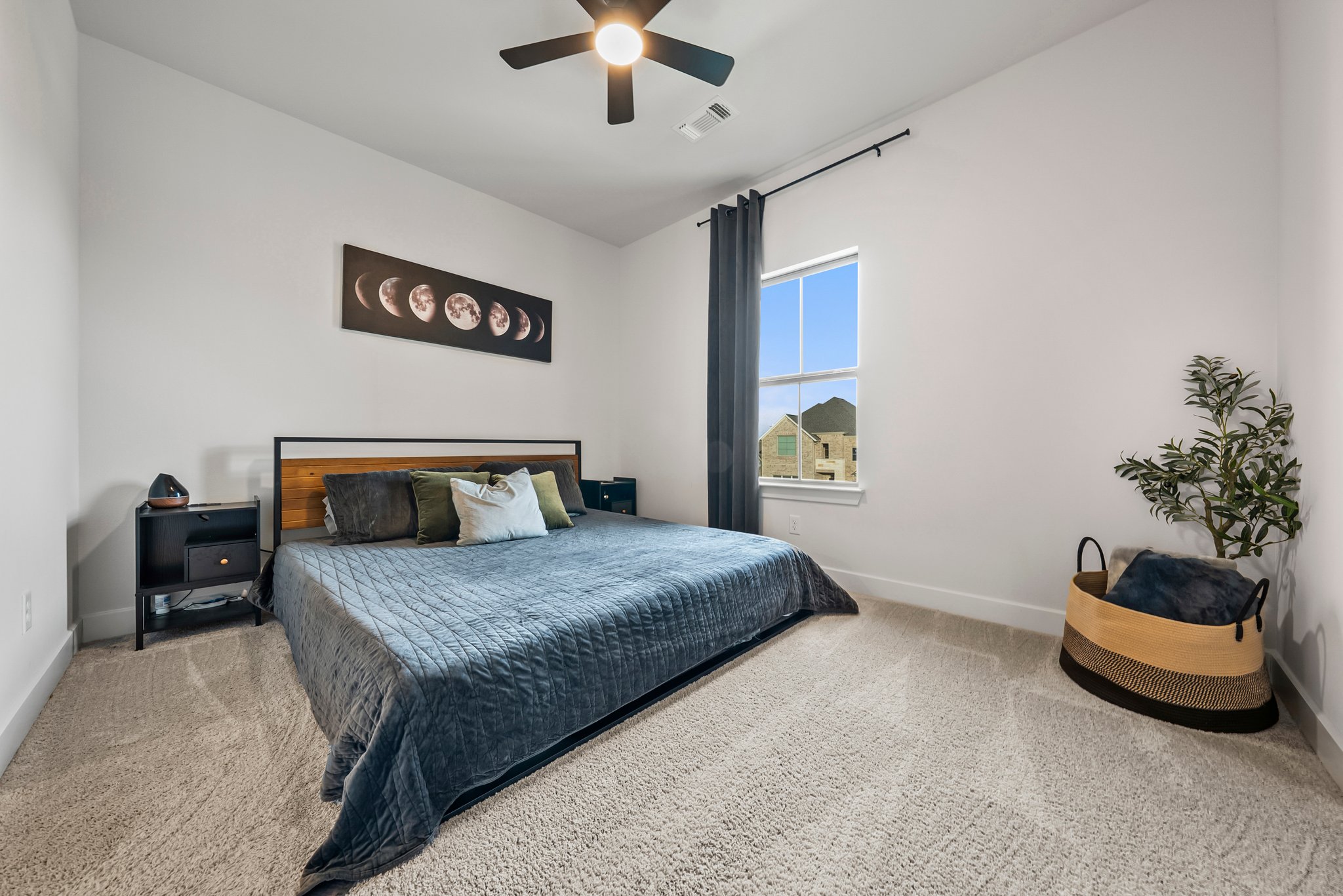 124 Low River Lane Georgetown, TX 78628 - Photo 34 of 39 a bedroom with a bed and a couch