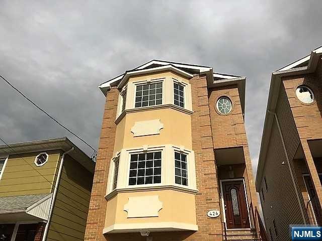 426 Jersey Street, Unit 1 GROUND Harrison, NJ 07029 - Photo 2 of 17 a view of a front door of house