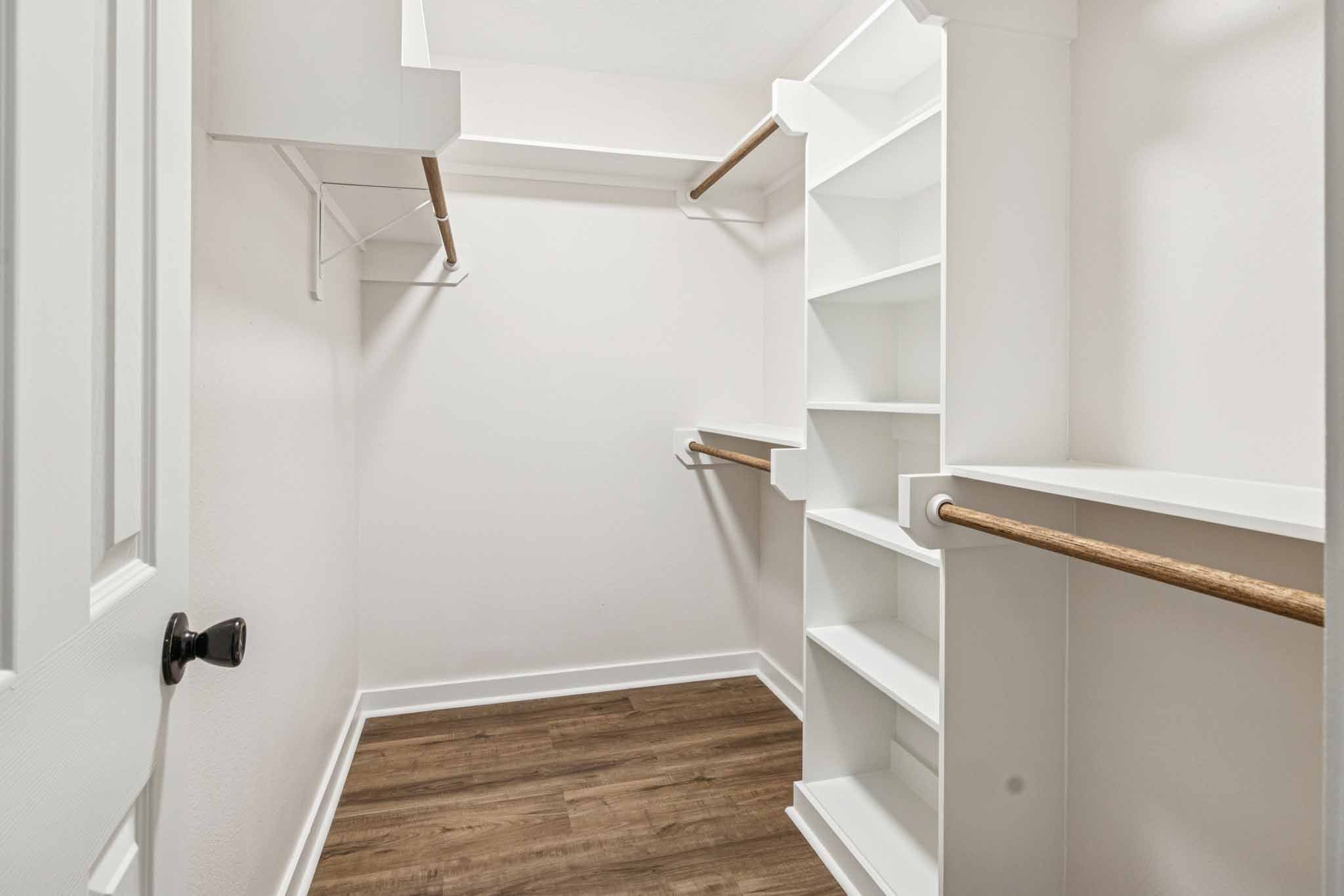 305 James Street Winnie, TX 77665 - Photo 15 of 25 a view of walk in closet with empty racks