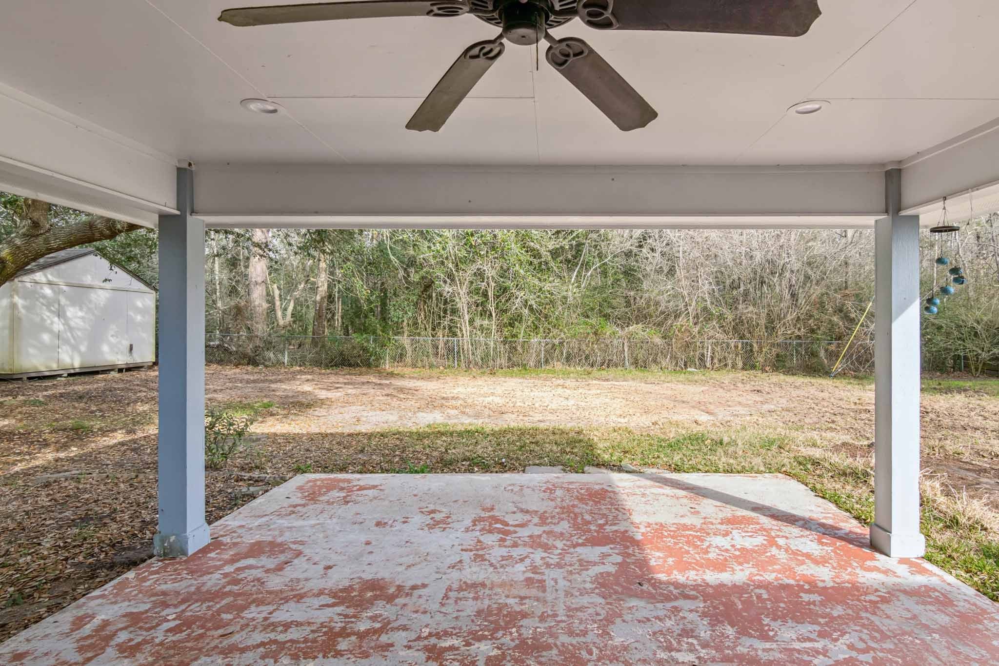 305 James Street Winnie, TX 77665 - Photo 23 of 25 a view of a room with wooden floor and a bed
