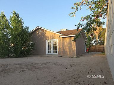 219 Larkspur Street Ridgecrest, CA 93555 - Photo 34 of 34 a view of a house with a yard