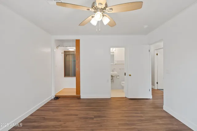 a kitchen with a refrigerator and stove