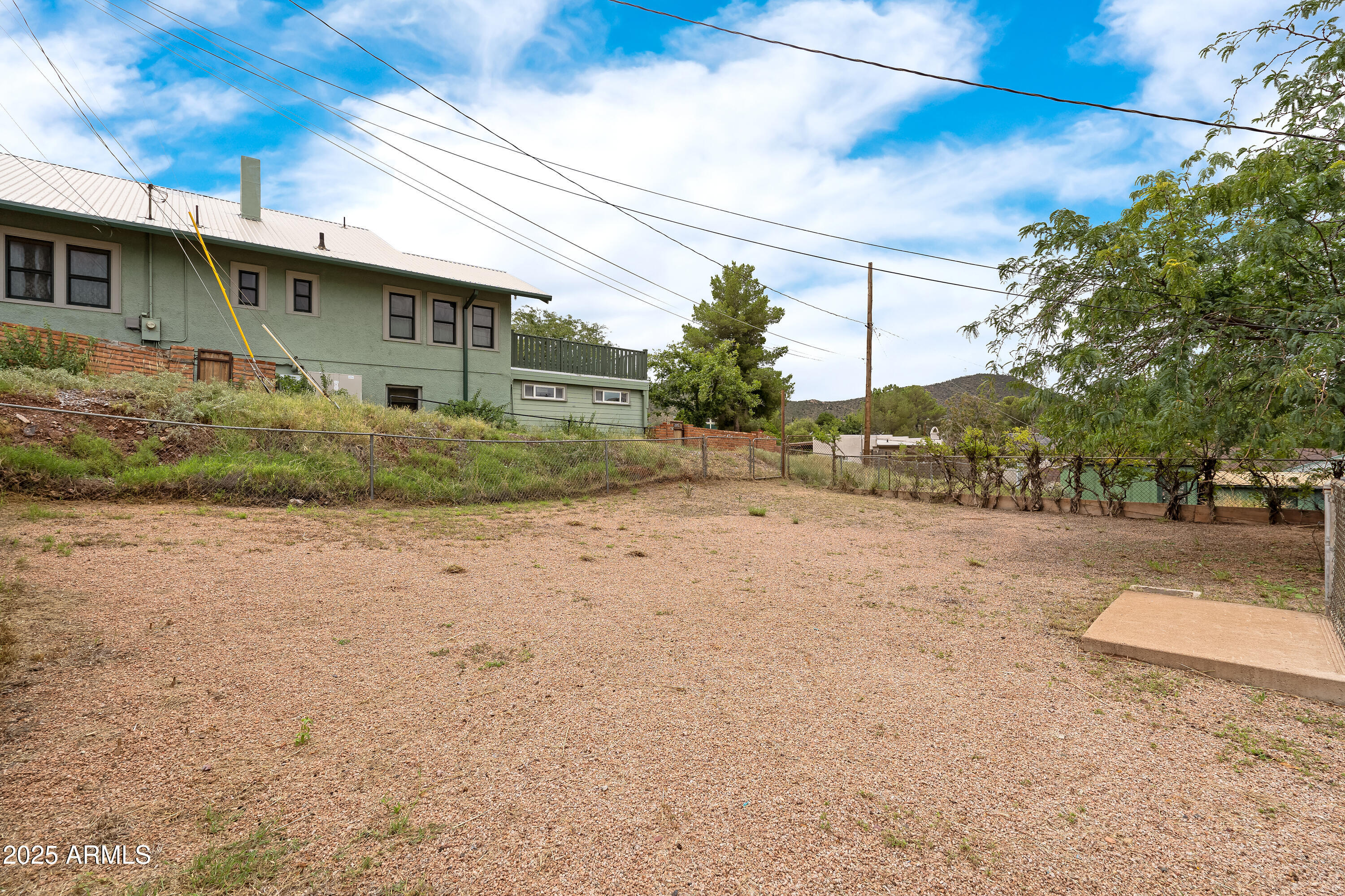 606 Oliver Circle Bisbee, AZ 85603 - Photo 25 of 30 a view of a house with a yard