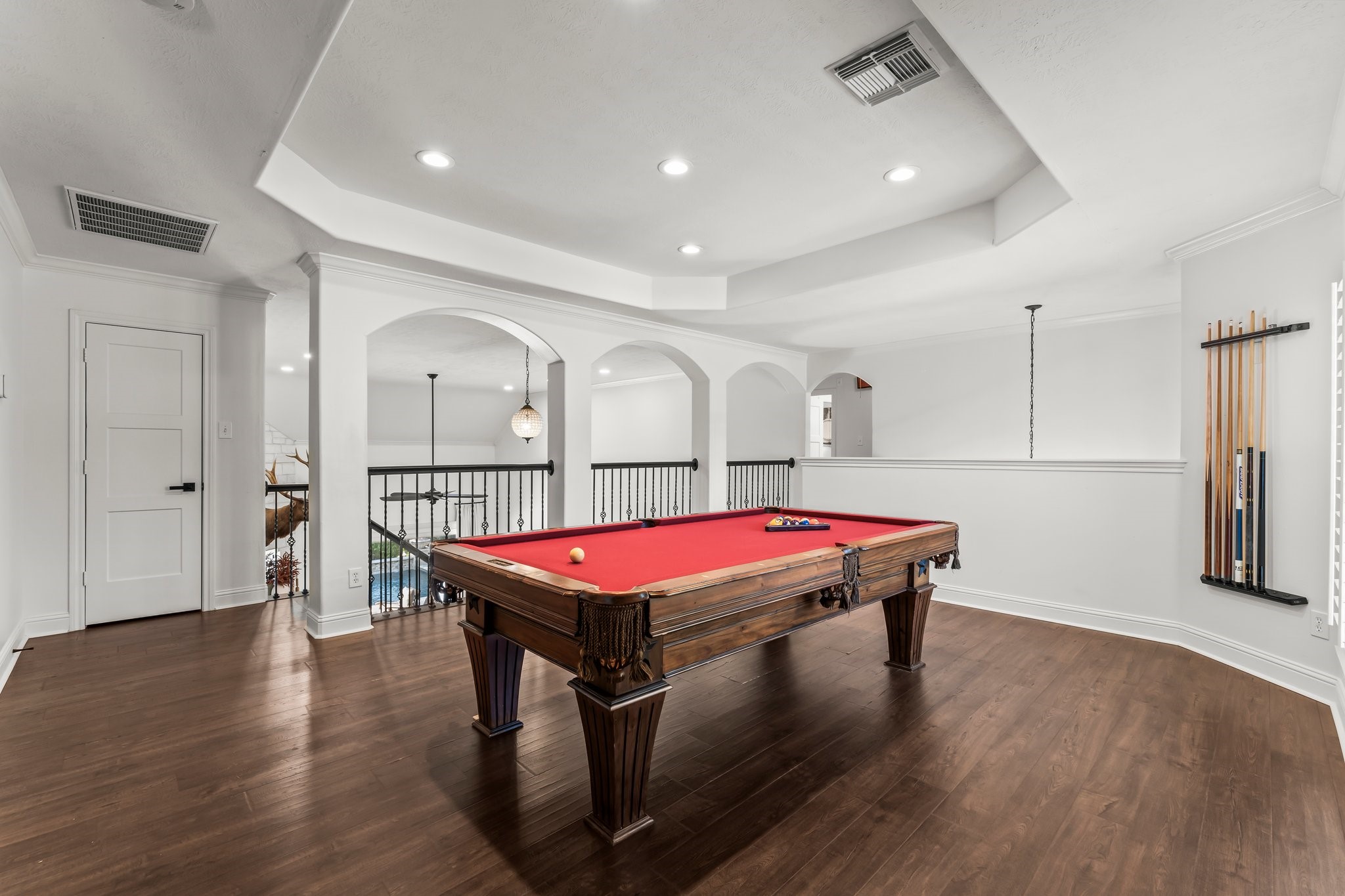 3126 Burton Ridge Drive Spring, TX 77386 - Photo 33 of 41 Spacious game room with open railing, recessed lighting, and flexible layout ideal for recreation or entertainment.