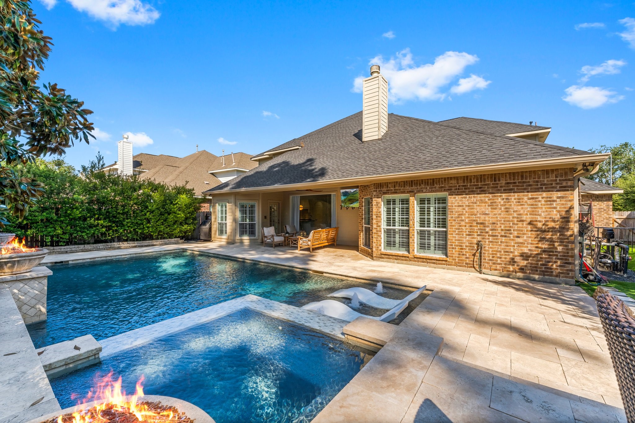 3126 Burton Ridge Drive Spring, TX 77386 - Photo 38 of 41 a front view of a house with swimming pool having outdoor seating
