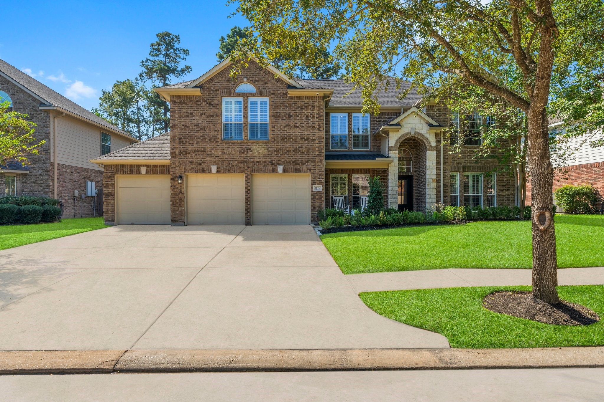 3126 Burton Ridge Drive Spring, TX 77386 - Photo 41 of 41 a front view of a house with a yard