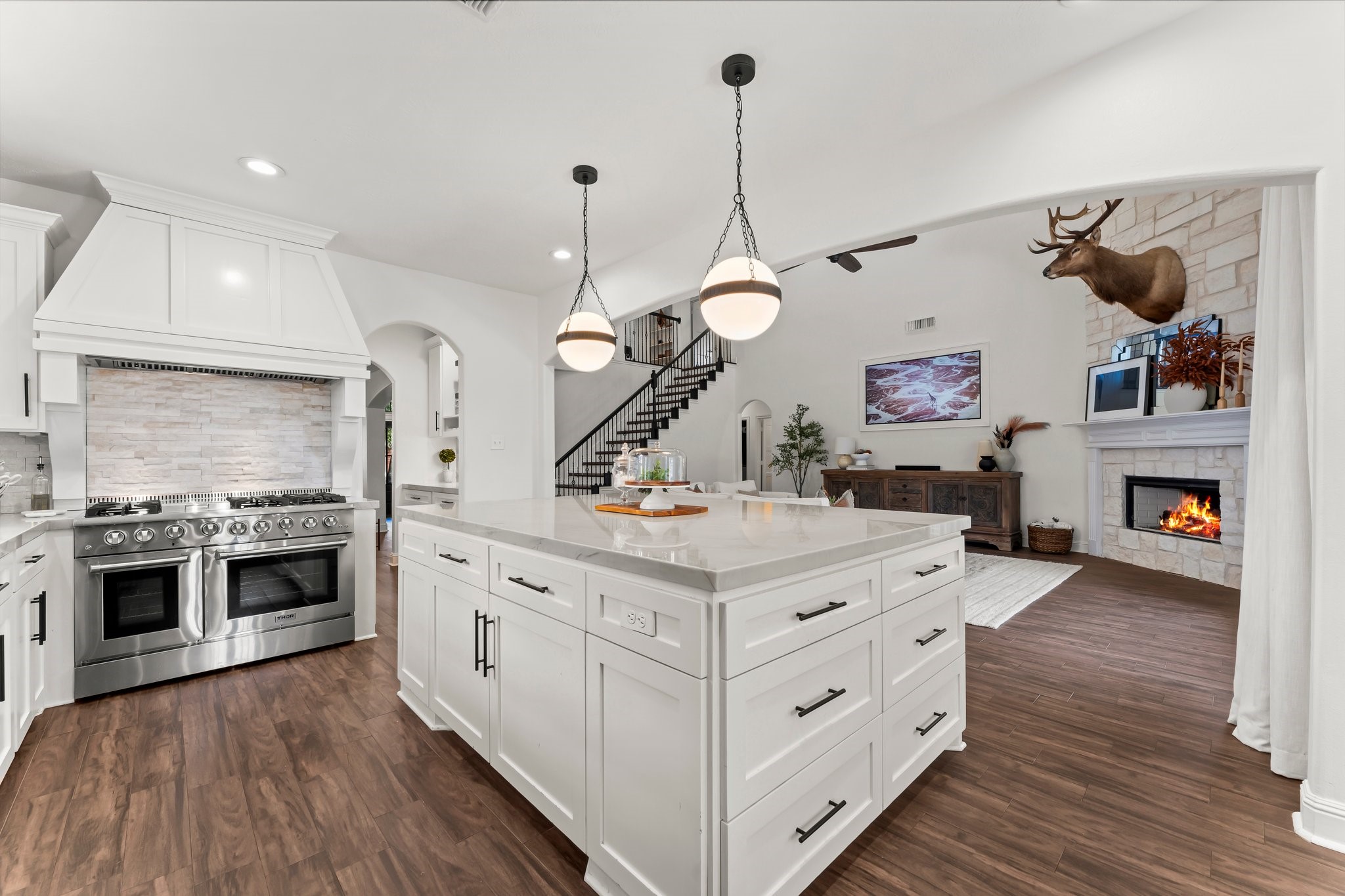 3126 Burton Ridge Drive Spring, TX 77386 - Photo 10 of 41 Open kitchen with large island, ample cabinetry, and seamless flow to the main living area, ideal for everyday living and entertaining.