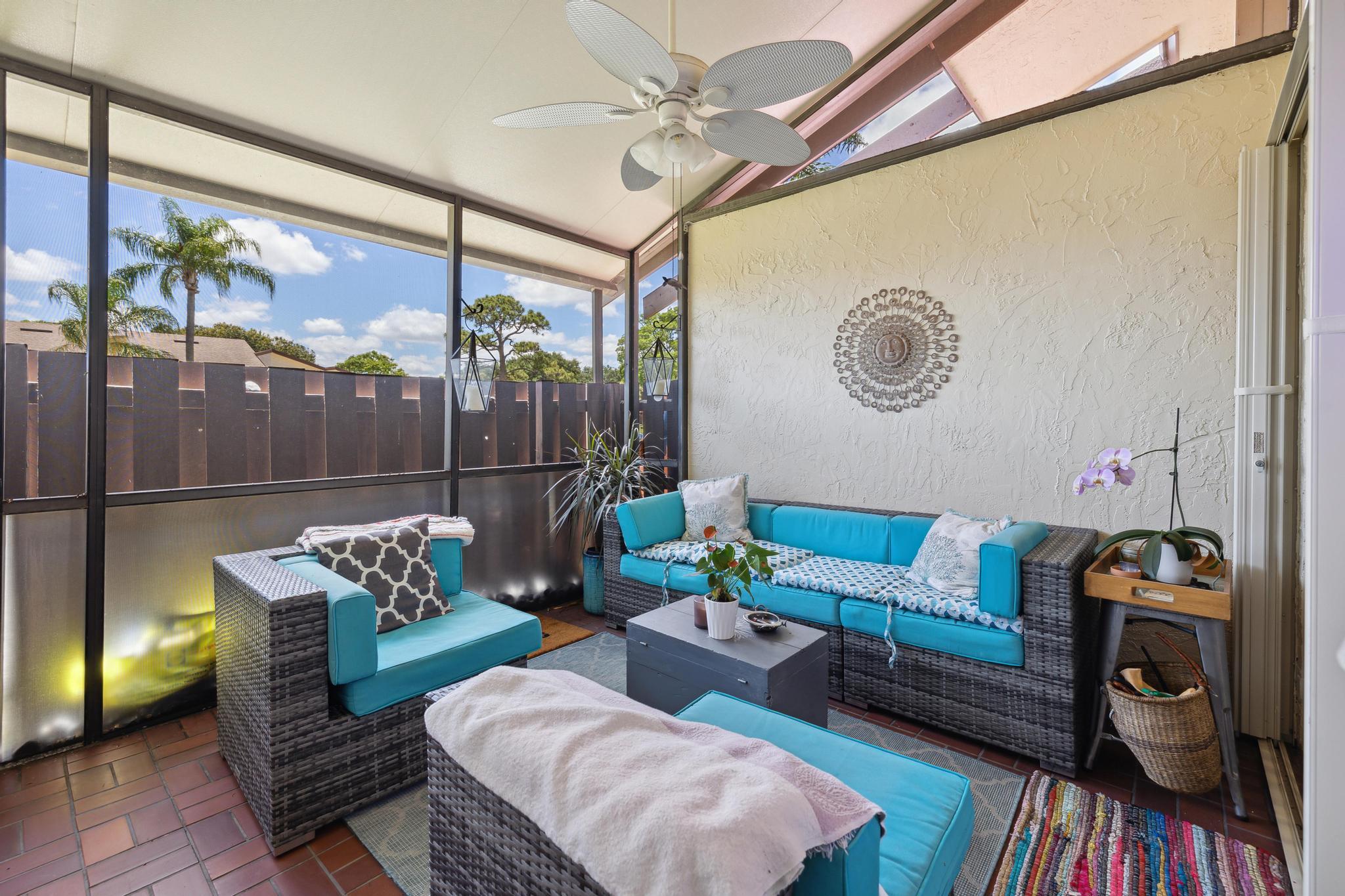 5131 Nesting Way, Unit D Delray Beach, FL 33484 - Photo 19 of 24 a living room with furniture and a wooden floor