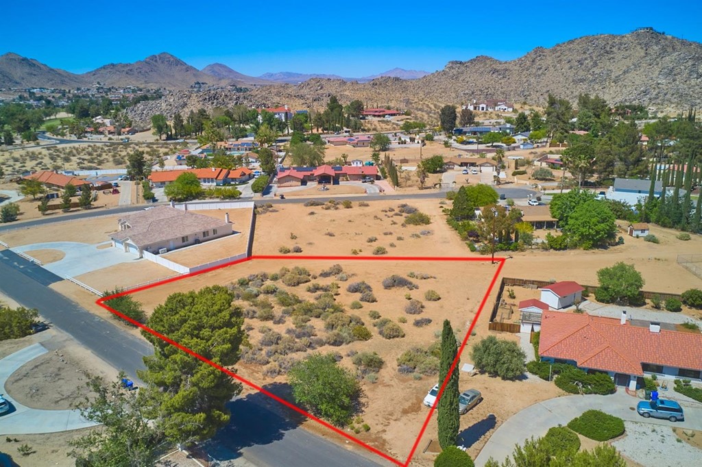 0 Chickasaw Road Apple Valley, CA 92307 - Photo 1 of 1 an aerial view of a house with a garden