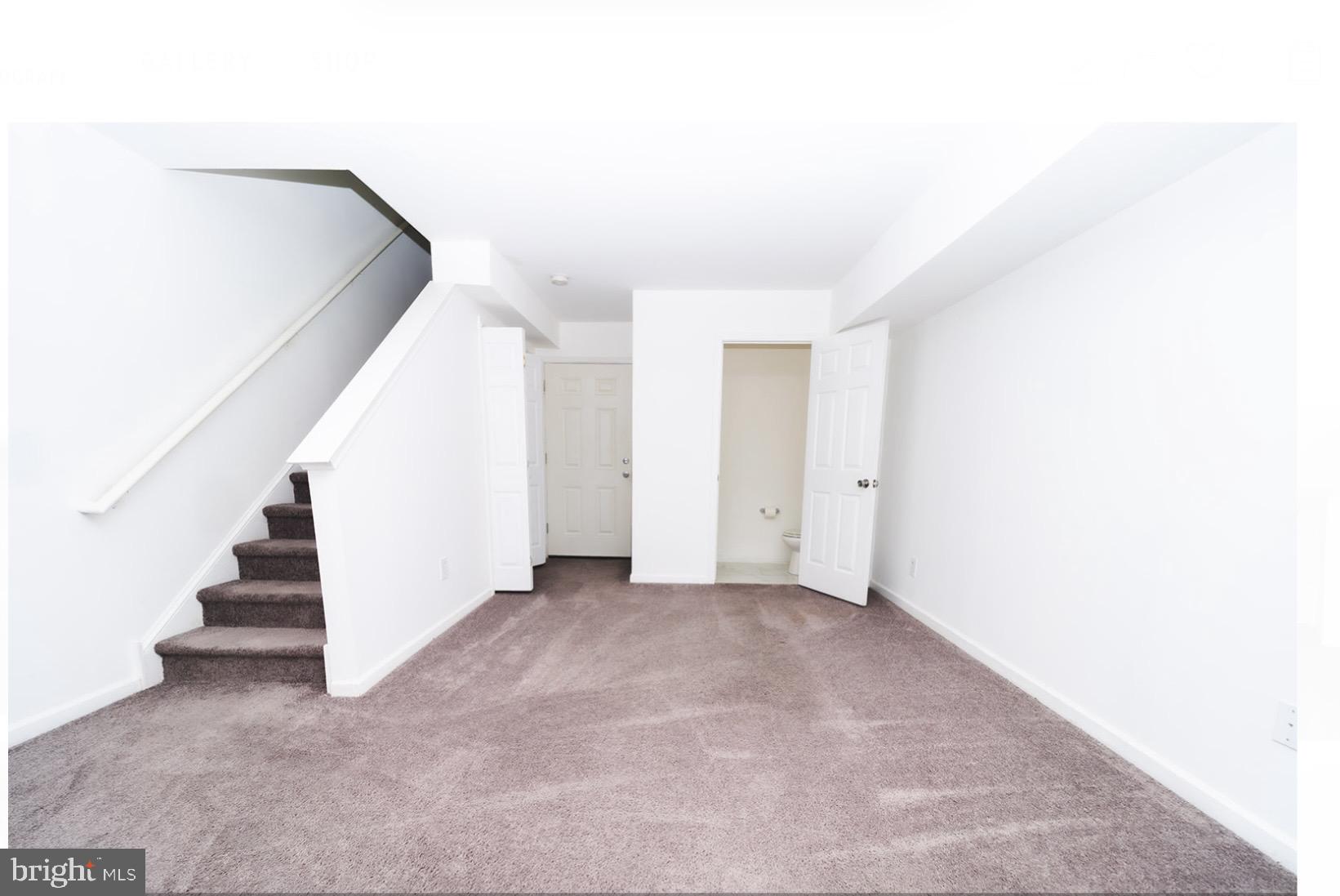 3 Union Street Marcus Hook, PA 19061 - Photo 16 of 23 a view of an empty room with stairs