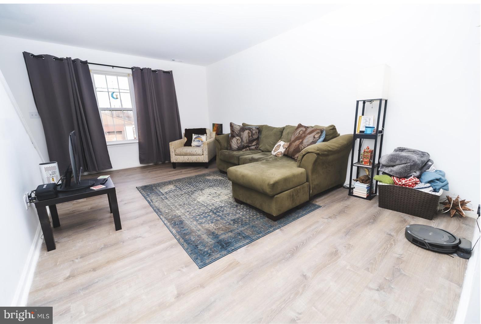 3 Union Street Marcus Hook, PA 19061 - Photo 2 of 23 a living room with furniture and a window