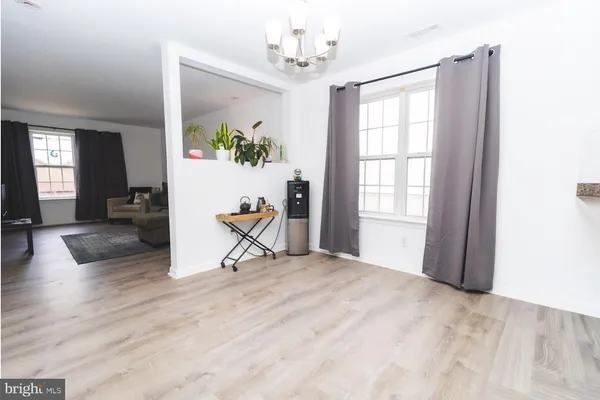 a view of a livingroom with a workspace