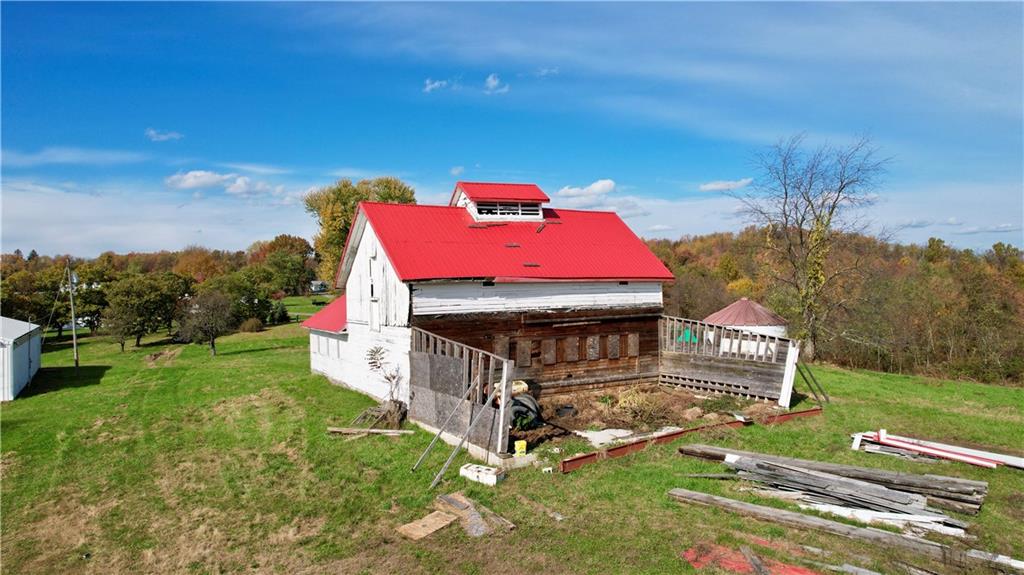 135 Friendship Lane Dunbar, PA 15431 - Photo 10 of 12 a view of a house with a big yard