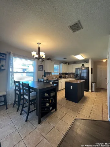 a kitchen with a cabinets and counter space