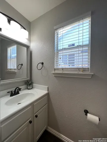 a bathroom with a sink and a vanity
