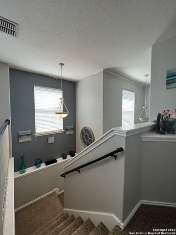 a room with gym equipment and window