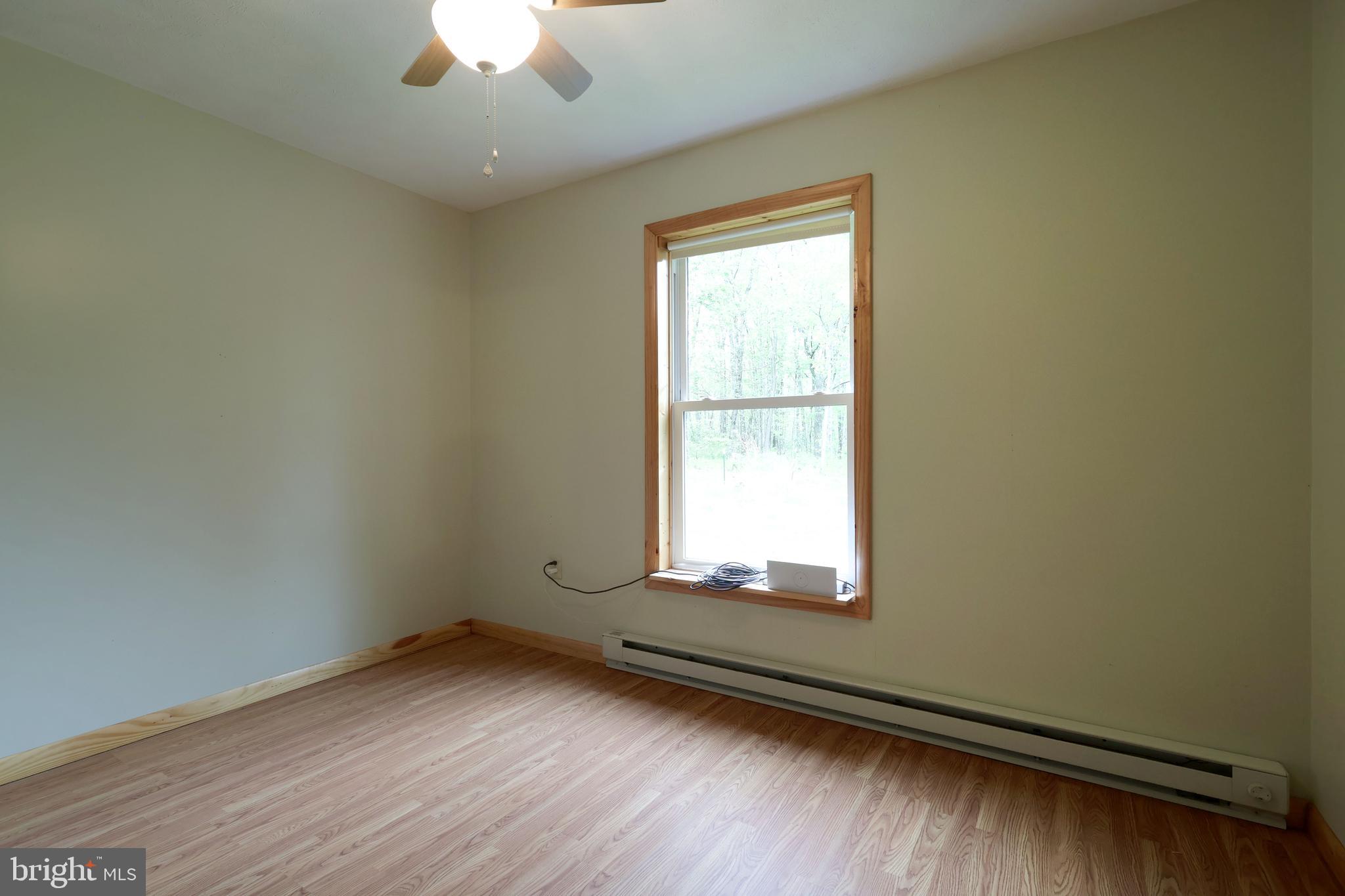 358 Buckridge Road Howard, PA 16841 - Photo 22 of 40 an empty room with a window