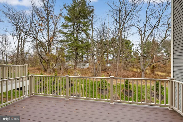 a view of a wooden roof deck