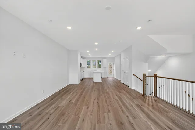 a view of a living room hardwood floor