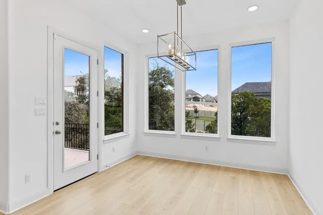 a view of storage and utility room with empty racks