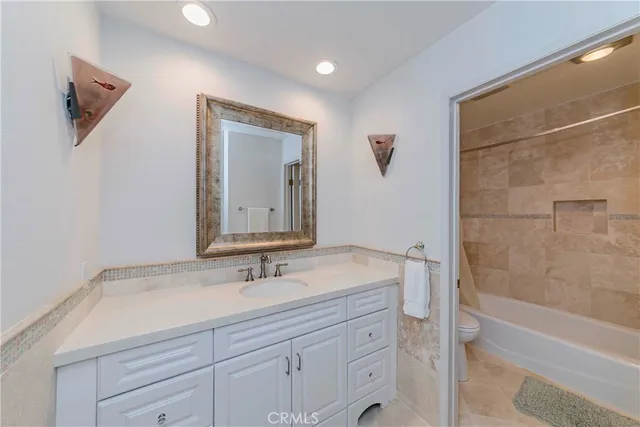a bathroom with a sink and a bathtub