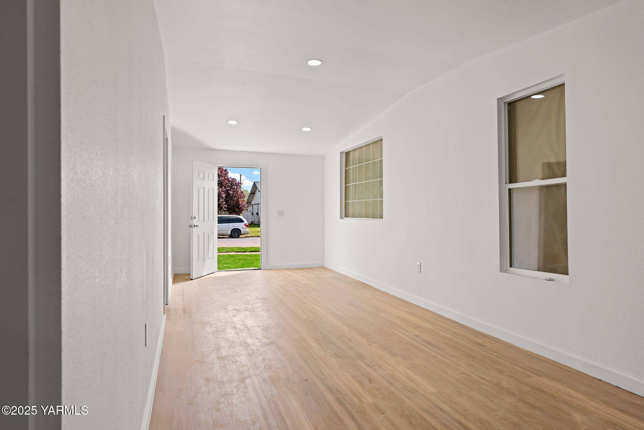 810 North 6th Avenue Yakima, WA 98902 - Photo 5 of 10 a view of a kitchen with wooden floor and entryway