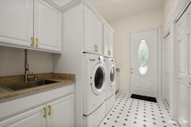 an empty room with fan and windows