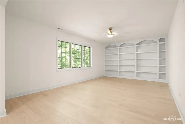 a view of a golf course with a lake