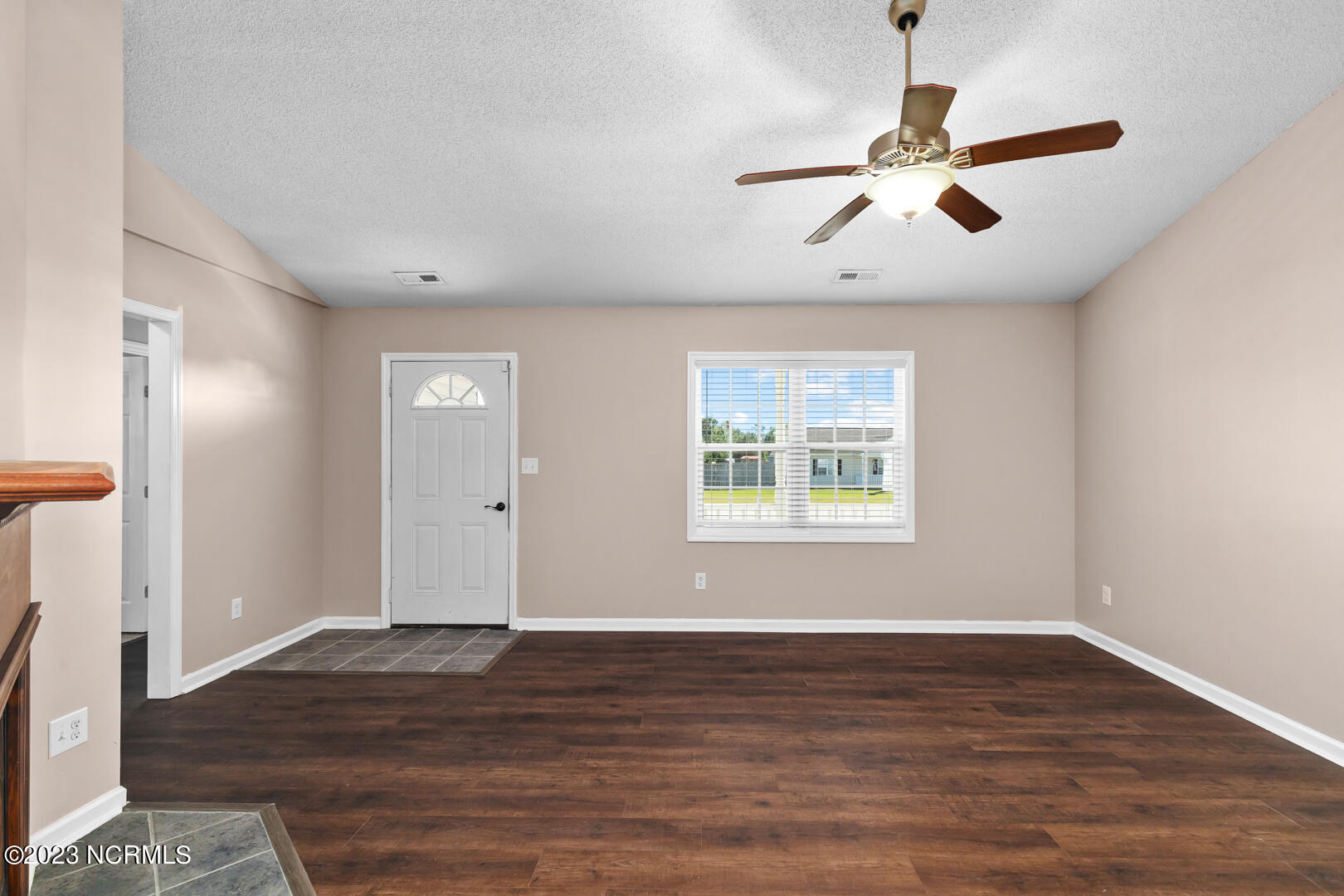 102 Jenna Rea Road Hubert, NC 28539 - Photo 5 of 30 102 JENNA REA ROAD WITH NEW FLOORING IN LIVINGROOM