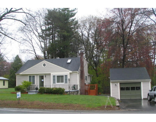 536 Potter Road Framingham, MA 01701 - Photo 1 of 12 a front view of a house with a yard