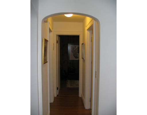 536 Potter Road Framingham, MA 01701 - Photo 11 of 12 a view of a hallway with wooden floor