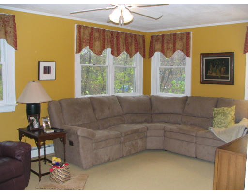 536 Potter Road Framingham, MA 01701 - Photo 2 of 12 a living room with furniture and a large window
