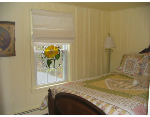 536 Potter Road Framingham, MA 01701 - Photo 3 of 12 a bedroom with a bed and a window