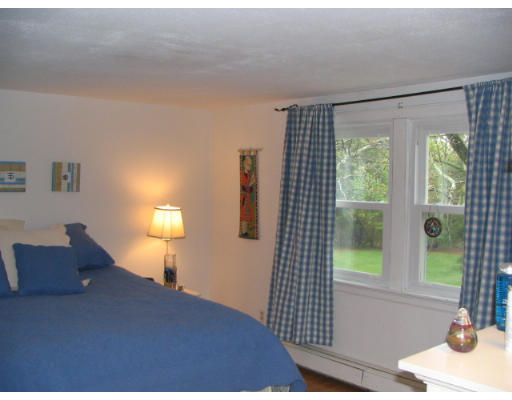 536 Potter Road Framingham, MA 01701 - Photo 5 of 12 a bedroom with a bed and a window