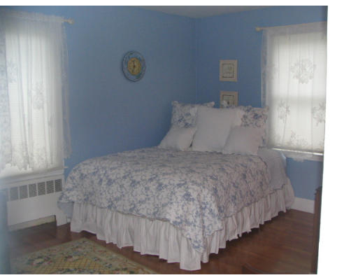 536 Potter Road Framingham, MA 01701 - Photo 6 of 12 a bedroom with a bed and window