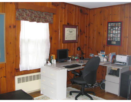 536 Potter Road Framingham, MA 01701 - Photo 8 of 12 a view of a workspace with furniture and a window