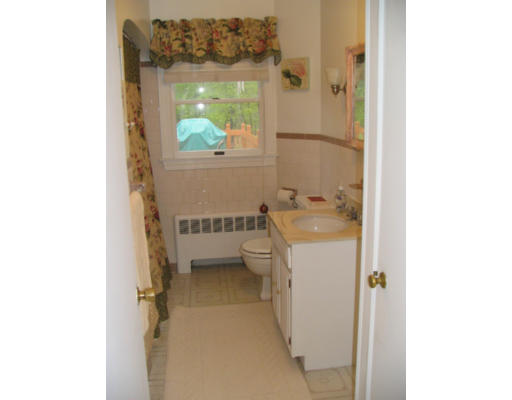 536 Potter Road Framingham, MA 01701 - Photo 9 of 12 a bathroom with a sink and a mirror