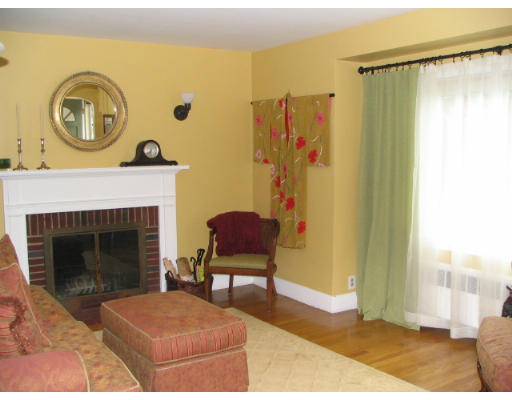 536 Potter Road Framingham, MA 01701 - Photo 10 of 12 a living room with furniture and a fireplace