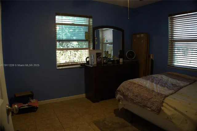 a room that has a window and storage in it