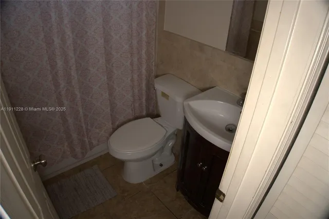 a view of a room with a window