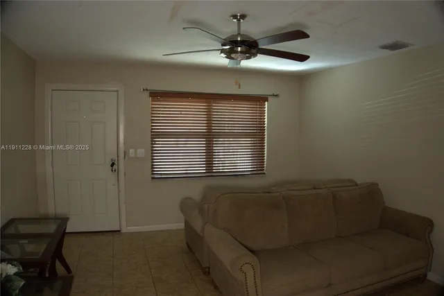 a view of a workspace with furniture
