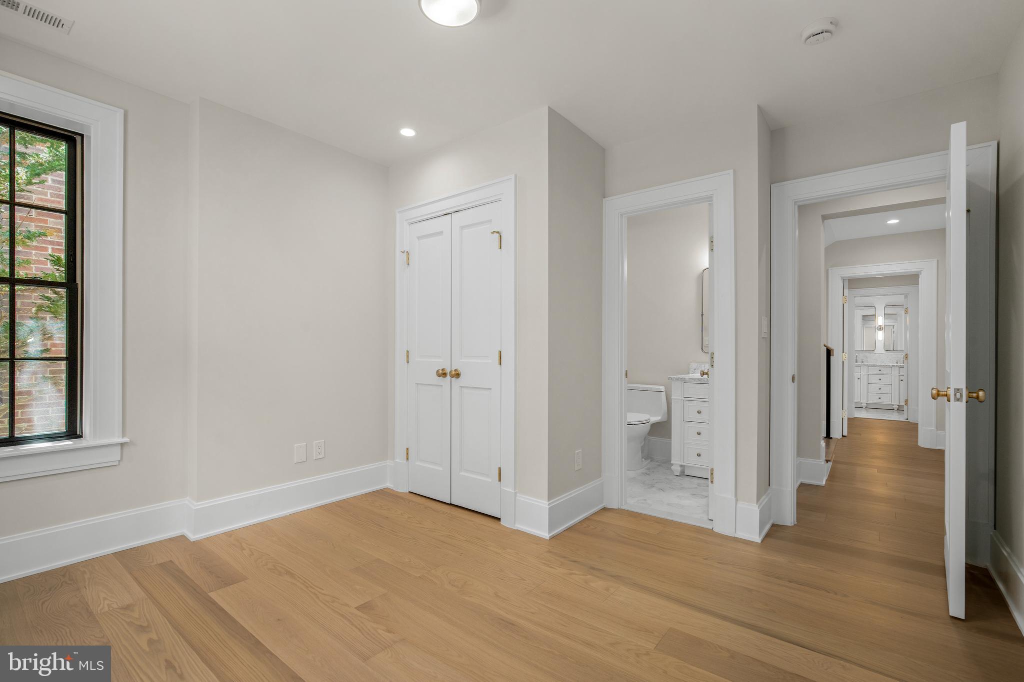 2710 36th Street Northwest Washington, DC 20007 - Photo 23 of 29 wooden floor and windows in a room