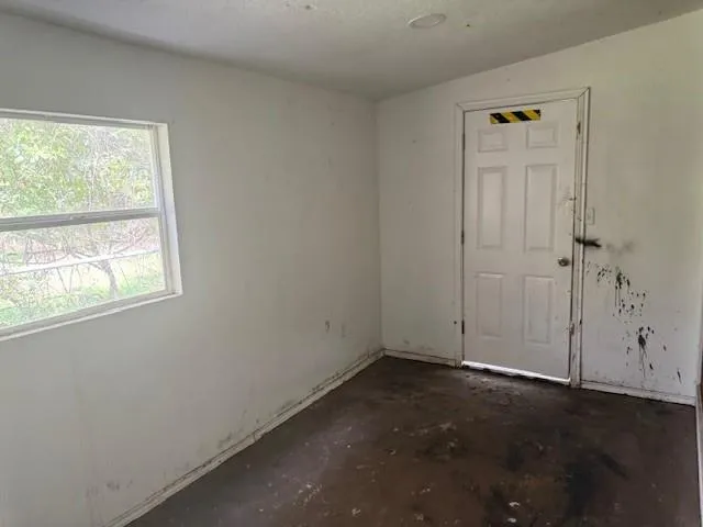 an empty room with a window
