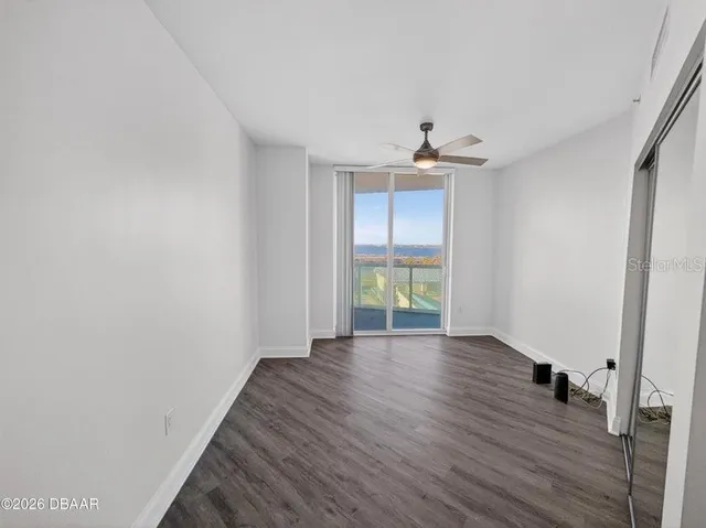 a kitchen with a stove and a refrigerator