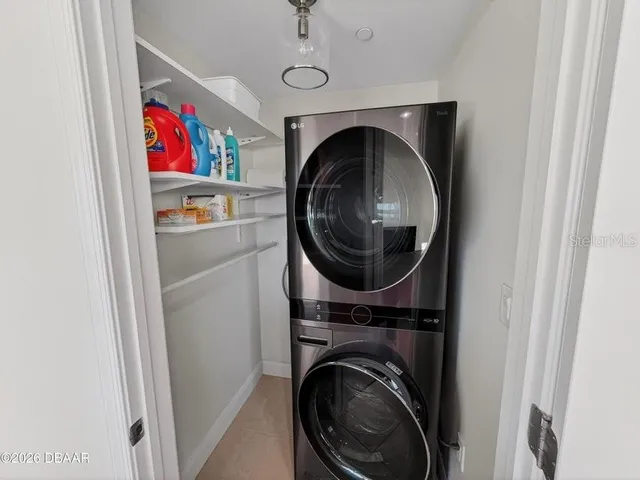 a view of a livingroom with furniture and window