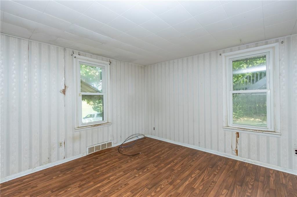 3675 Lutheran Church Road Apollo, PA 15613 - Photo 14 of 20 an empty room with wooden floor and windows