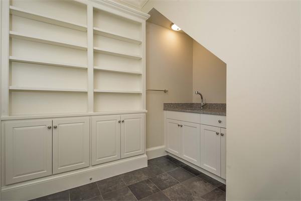 14 Hastings Road Lexington, MA 02421 - Photo 19 of 26 a bathroom with a granite countertop sink and vanity