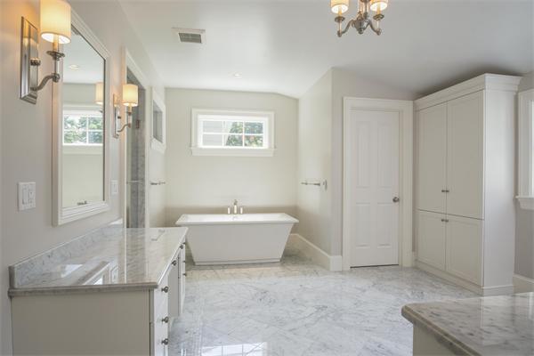 14 Hastings Road Lexington, MA 02421 - Photo 22 of 26 a spacious bathroom with a granite countertop sink a toilet and shower